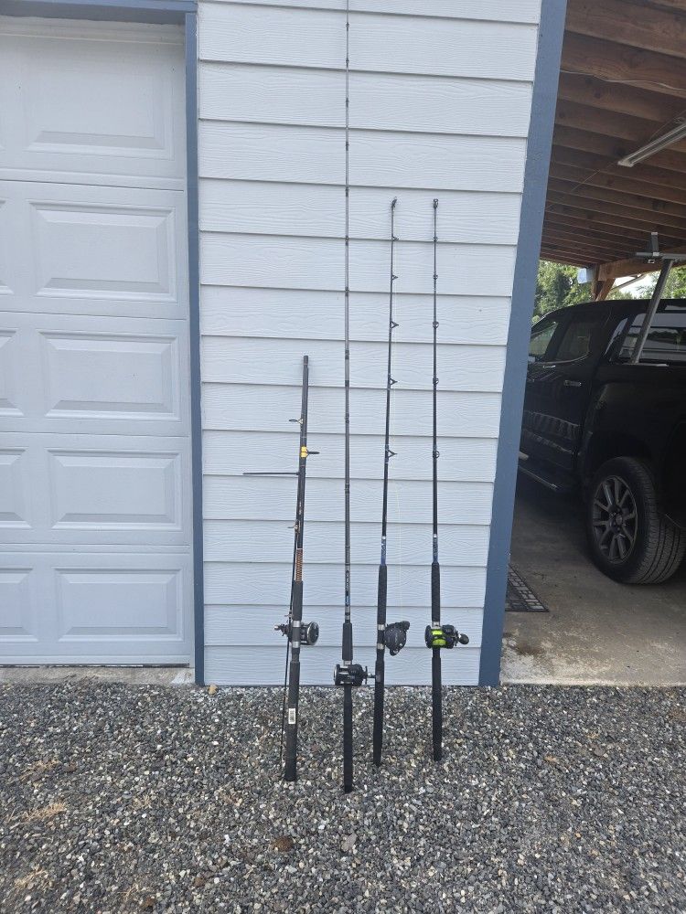 4 Fishing Poles And Reels