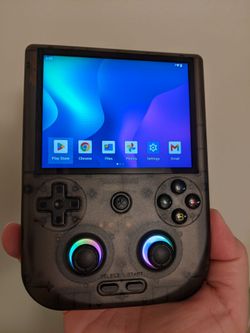 Anbernic RG406V with original box, travel case, and comfort grip