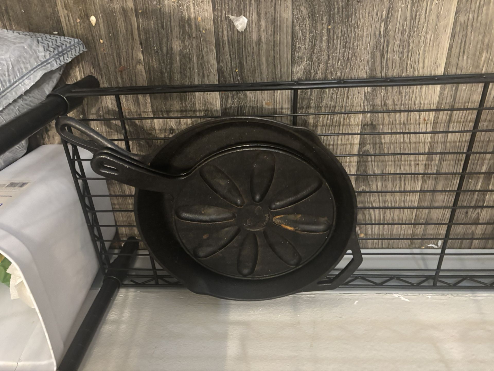 Large cast-iron pan like new also have two flat jalapeño iron skillets