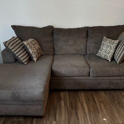 Gray L shaped sofa (Cornell Pewter Sofa With Chaise )