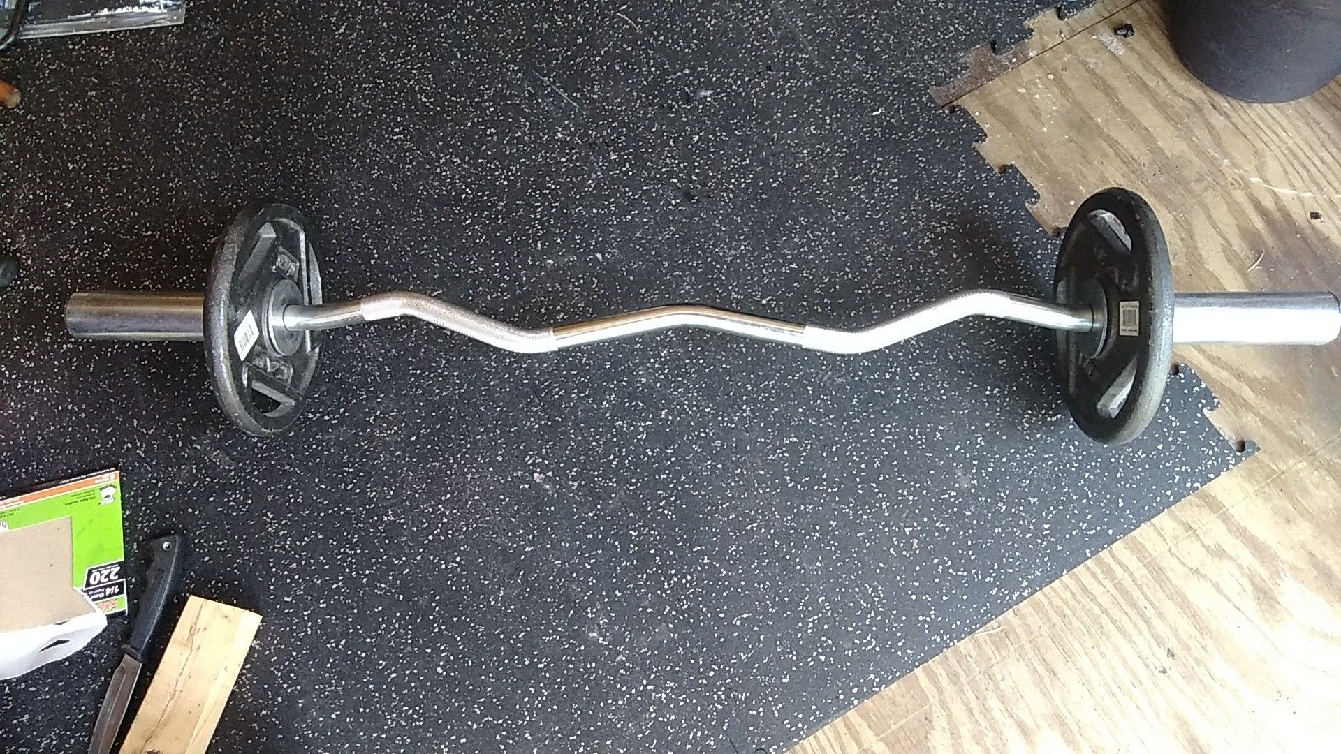 Olympic curl bar with 20 lbs of new grip weights and 2 collars $75 firm