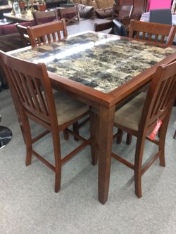 Dining table with 4 chairs in the box