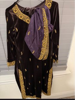 Women valvet brown color fancy embroidered 3 pieces dress.