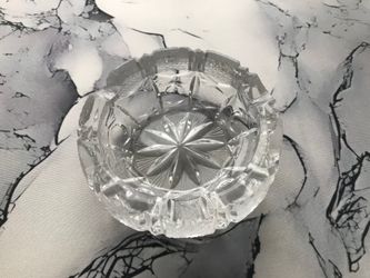 This item is a vintage American Brilliant or Bohemian heavy clear cut crystal cigar ashtray.