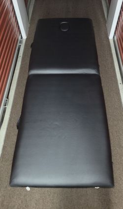 Massage table