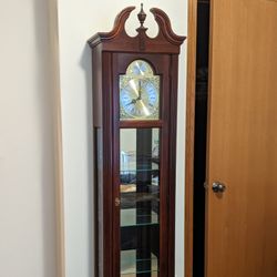 Howard Miller Tempus Fugit Curio Grandfathers Clock