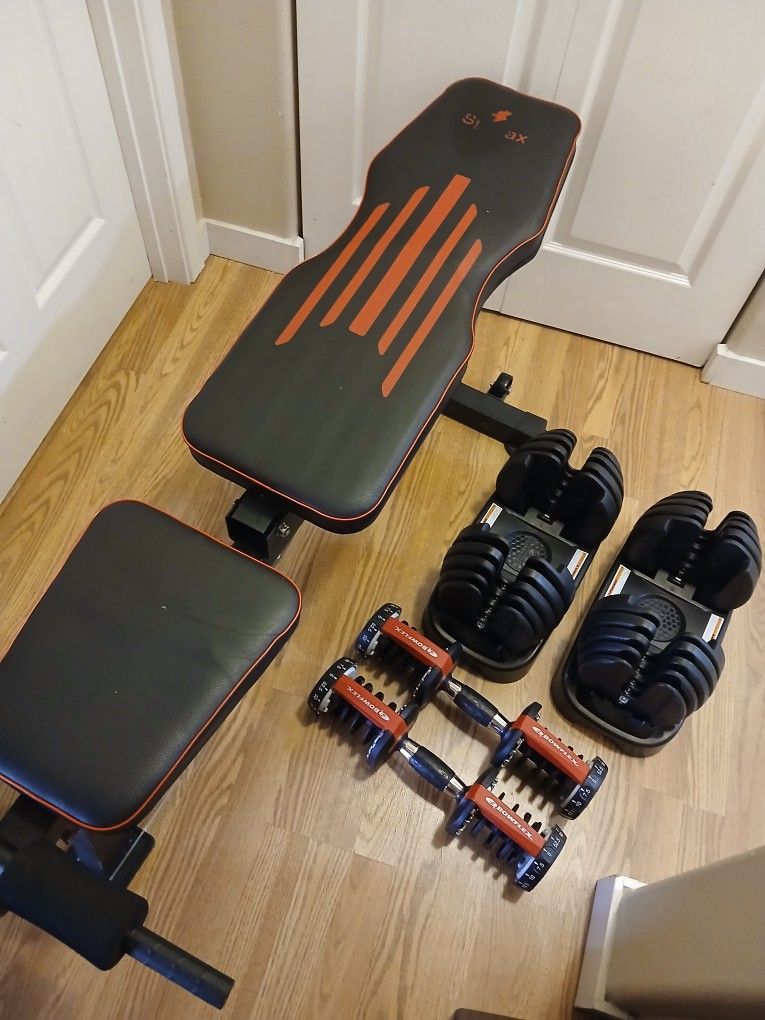 Bowflex SelectTech 552 Adjustable Dumbbells With Adjustable bench press.
