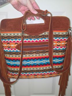 Leather purse made in ecuador from alpaca fur