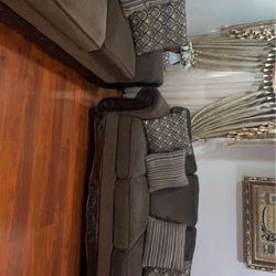 Two Sofas (including 7 Pillows)