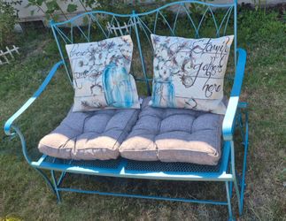 Wrought iron glider bench
