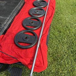 Set With Kettle Weight Plates And Solid Steel Barbell