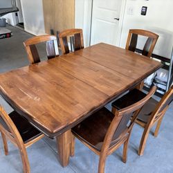 Solid Wood Table And 6 Chairs