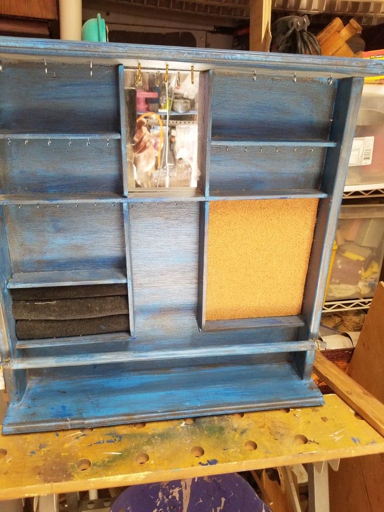 Jewelry case measures 20 wide , 20 tall & 4 inch depth. It has approx 40 hooks,a place for rings & a bar to hang bracelets on.