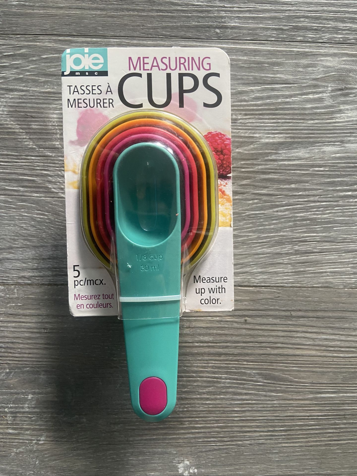 Joie Teal Handle Nesting Measuring Cups with Pink, Yellow, Orange, Green