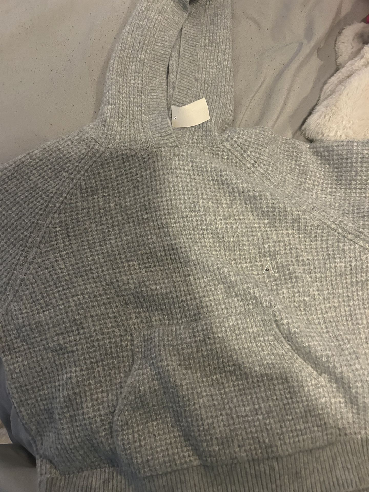 hooded gray sweater