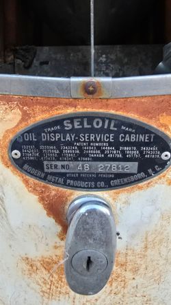 Gas station oil stand