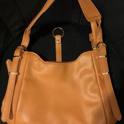 Brown and gold hand bag
