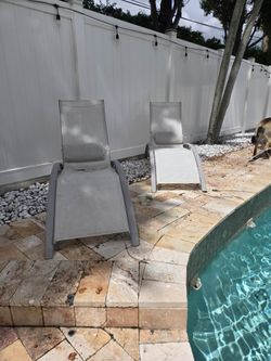 Set of 2 comfortable outdoor chaise lounge chairs originally purchased from Bed Bath & Beyond.