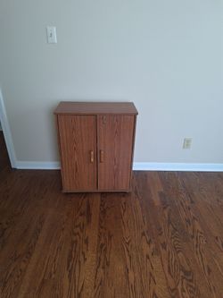 Small Wood Laminate Storage Cabinet with Lock-$40