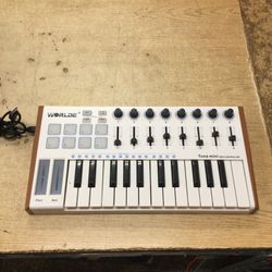 HX Worlde 25 Key USB Portable Tuna Mini MIDI Keyboard MIDI Controller with 8 Knobs, 8 Drum Pads, 8 Faders, Wood Imitation Rim, Pedal Interface, for Ma