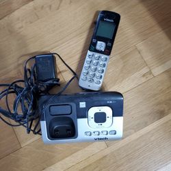 Box Of Binders And Home Phone