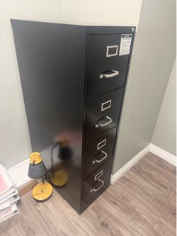 Black/ Silver Handle/ Inside with Four Drawers Filing Cabinet. PICKUP ONLY in Granada Hills 91344 Area EVERYTHING MUST GO by Monday June 29th.