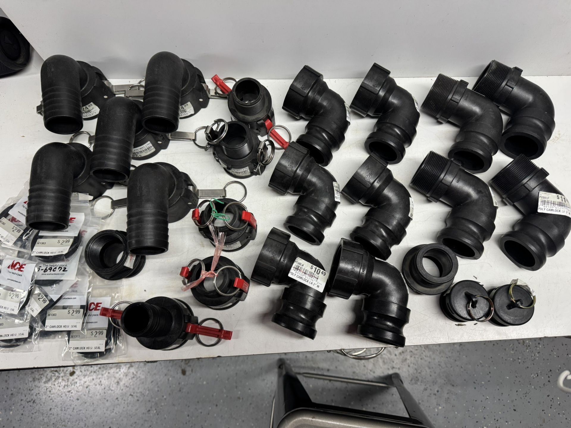 Large Lot Of 2” Cam Fittings New. $50 Takes All. Must Pick Up