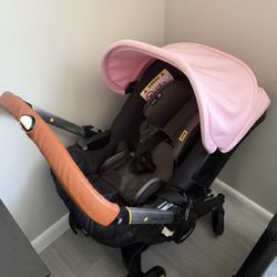 TWO Car Bases And Blue And Pink Covers For Doona  Stroller 