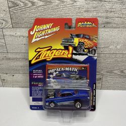 Johnny Lightning  Zinger Burnout Blue ‘1962 Chevy Impala Coupe / Street Freaks • Die Cast Metal and Chassis • Made in China