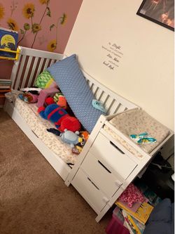 Crib with changing table