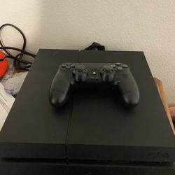 ps4 with controller and a few games