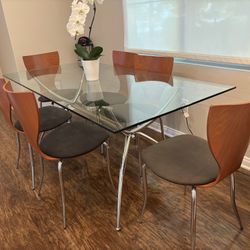 Glass Dinning Table And 6 Chairs