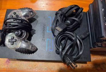 Playstation 2  ps2 with controller/15 games- $160 OBO