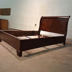 Legacy queen sized sleigh style bed