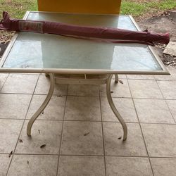 Outdoor Table W/ Pink Umbrella