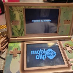 NINTENDO DS LITE PORTABLE CONSOLE WITH CHARGER INCLUDED. A Most NEW 