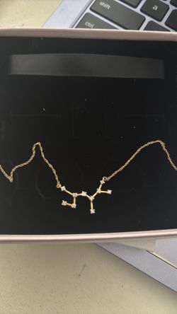 10kt diamond saggitaries necklace 140$ very firm deal