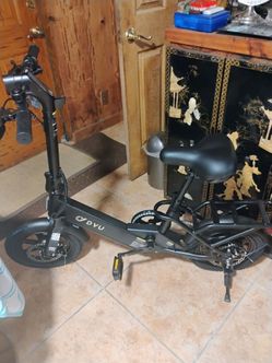 Ebike 20 mph 20 miles per charge new unused comes with charger and toolkit back rack