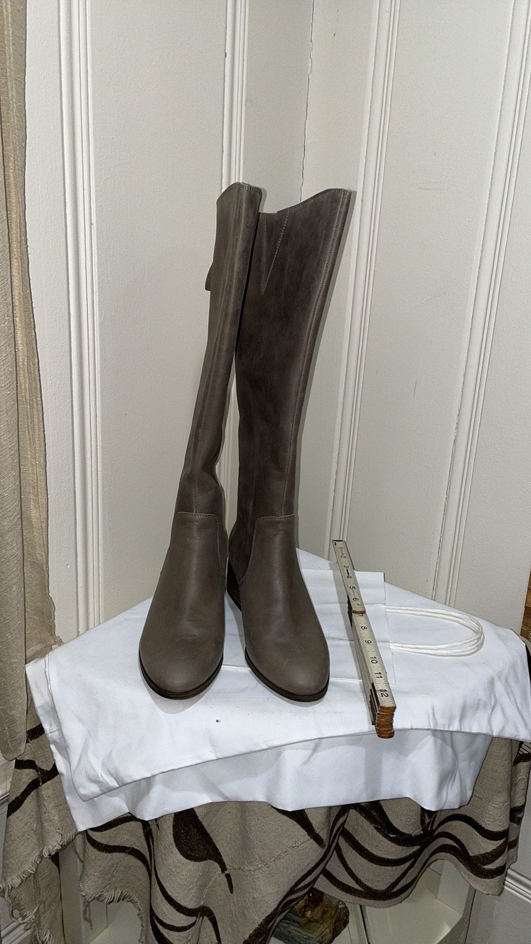 Lucky Brand riding boots in a grayish brown color. New with tags.  Size 8M