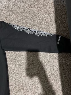 Black zip-up hoodie with Chrome-inspired cross logo on chest.