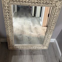 Title: Vintage Style Carved Wall Mirror – Cream Distressed Frame  Price: $120 (or best offer)  Description:   Beautiful vintage-style wall mirror with