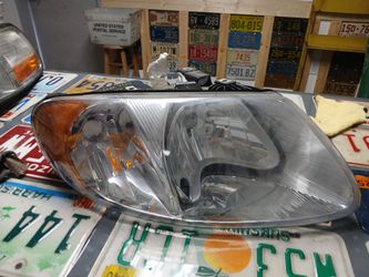 01-07 Caravan Tow and Country Right Passenger Side Headlight aftermarket
