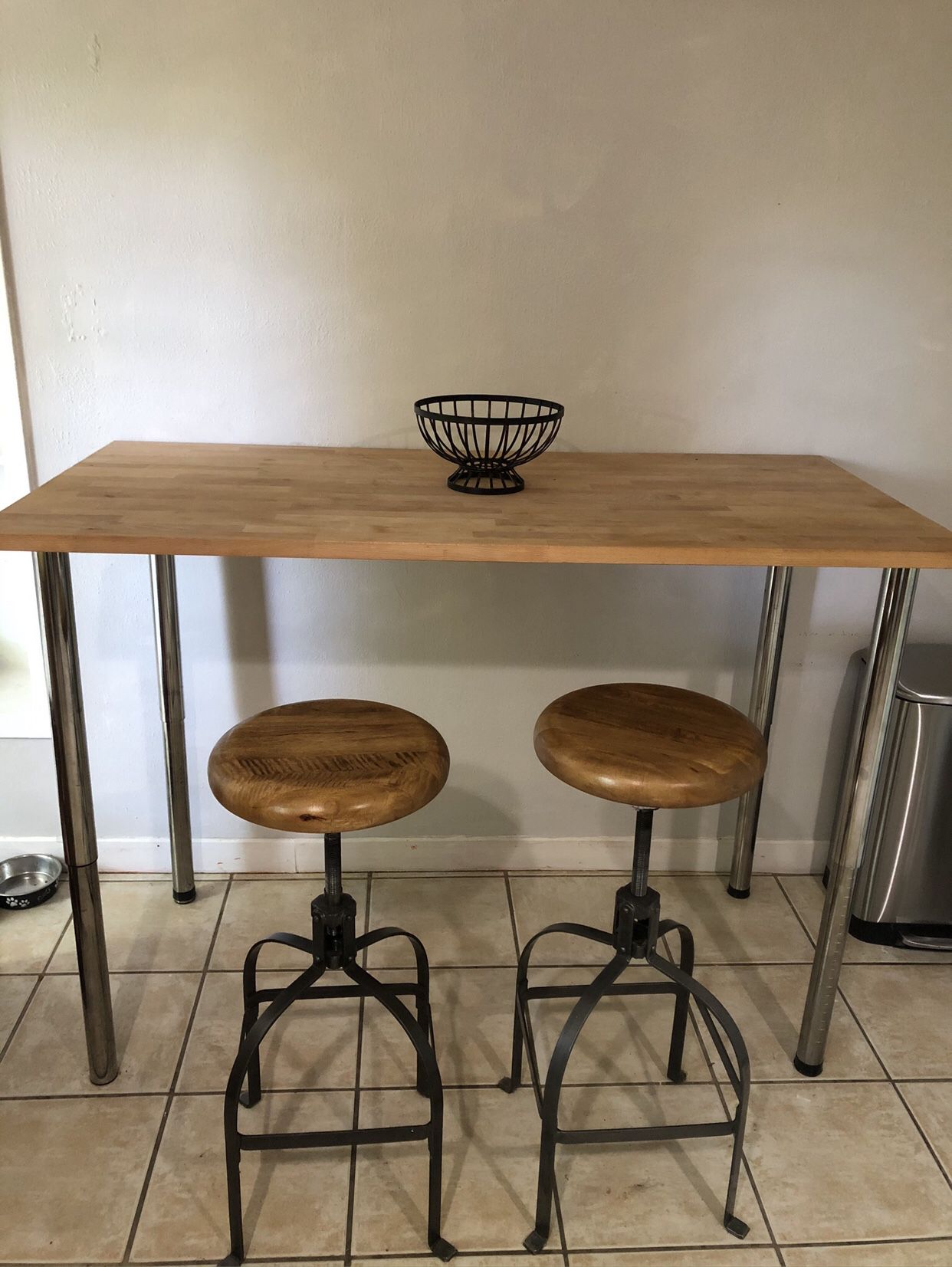 Kitchen table with two bar stools