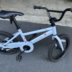 Co-op Cycles REV kids' bicycle, 16-inch  in white.