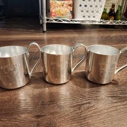 set of 3 vintage Smirnoff Moscow Mule mugs, made of copper-tinted aluminum. 