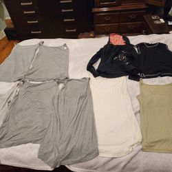 Maternity Women's size medium tank tops and every day tunic tank top
-7 tank tops
-1 sweat Shirt
 Or Best Offer