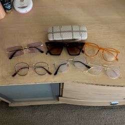 Blue Light and A Pair Of Sunglasses w/ Case