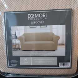 Sofa Slip Cover New In Package Size Small, Color Light Beige.