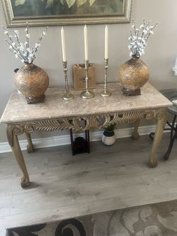 2 entry way tables with out of the decoration