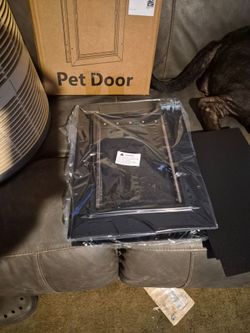 Dog door small, new